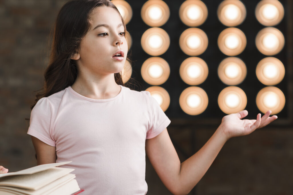 girl-performing-front-stage-light